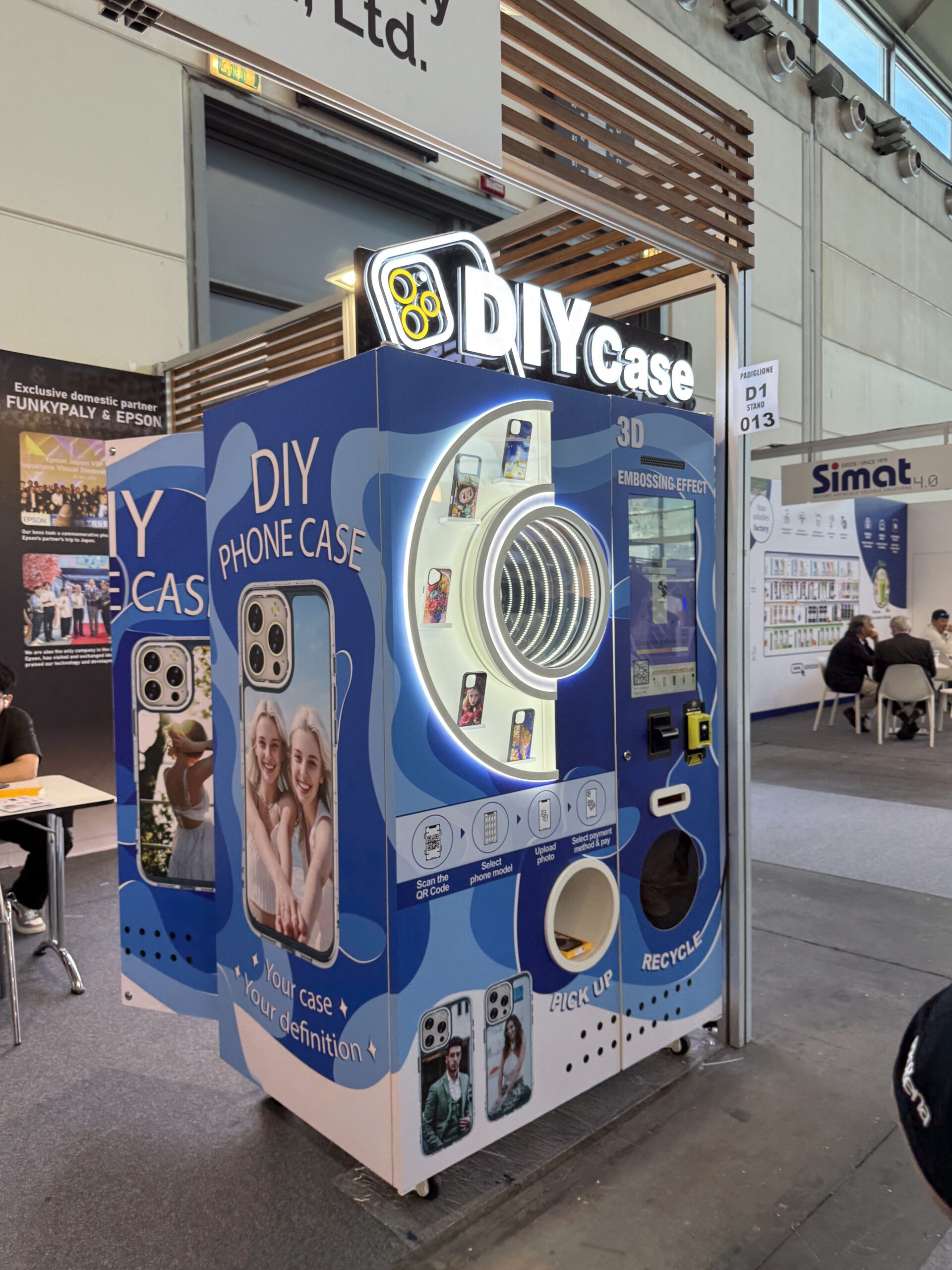 Custom phone case printing vending machine that prints your own photo onto a phone case