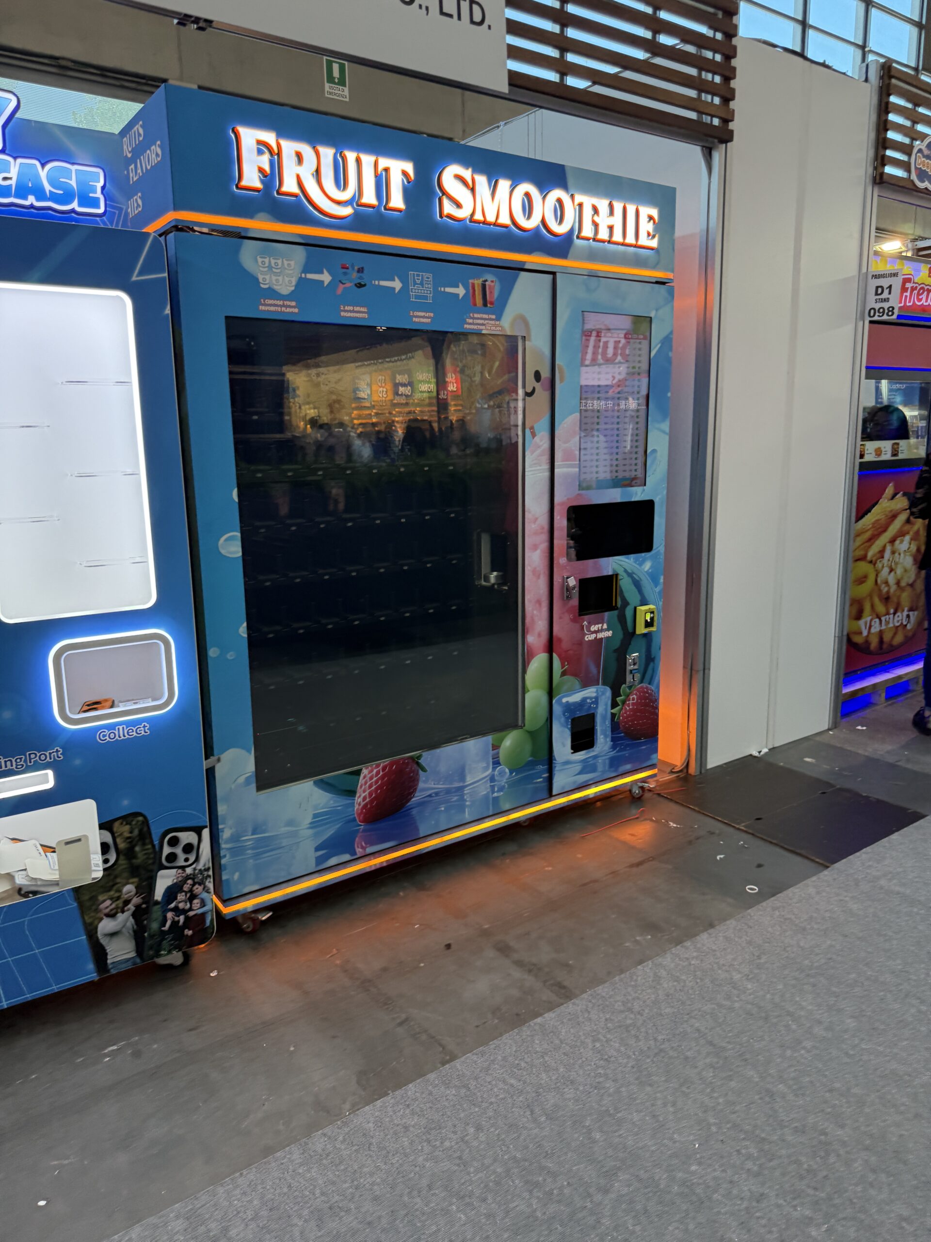 Touchscreen on a smoothie vending machine showing flavour choices